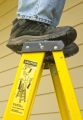 man standing on ladder